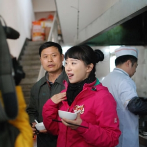 央视《远方的家》走进九江县新合豆条